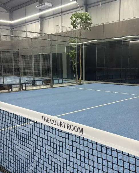 The Court Room net across a blue court